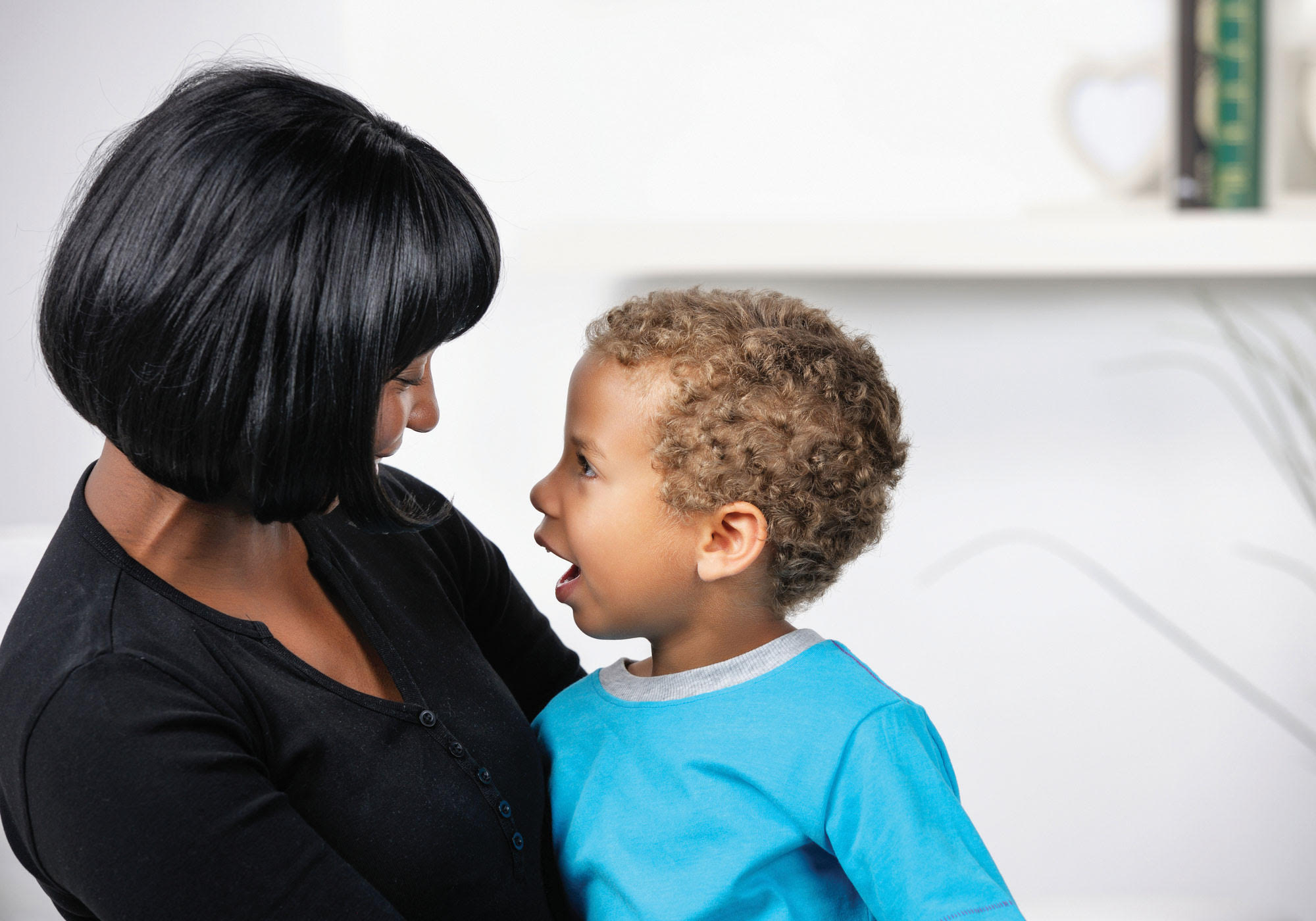 Mom talking to small child