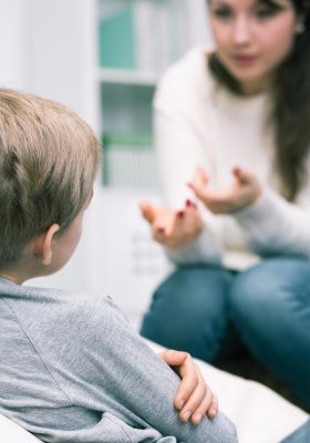 Mom talking to her son