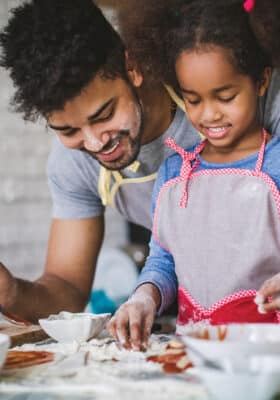 Dad baking with daughter