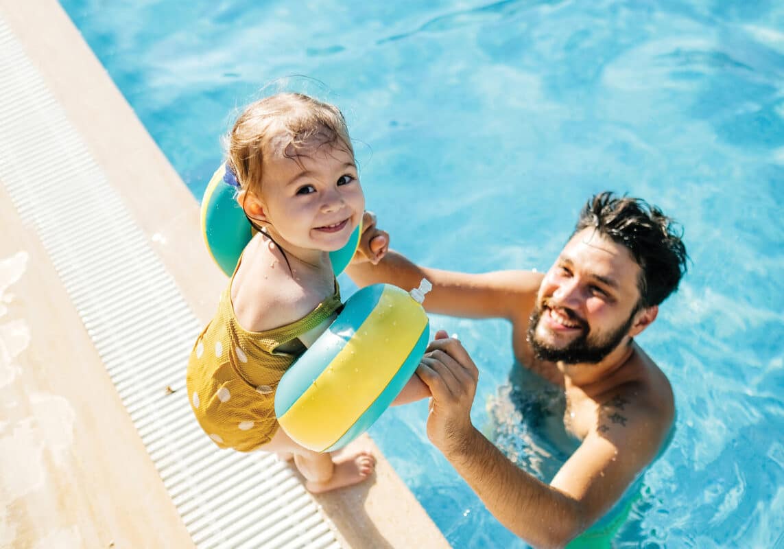 dad and baby at swim class
