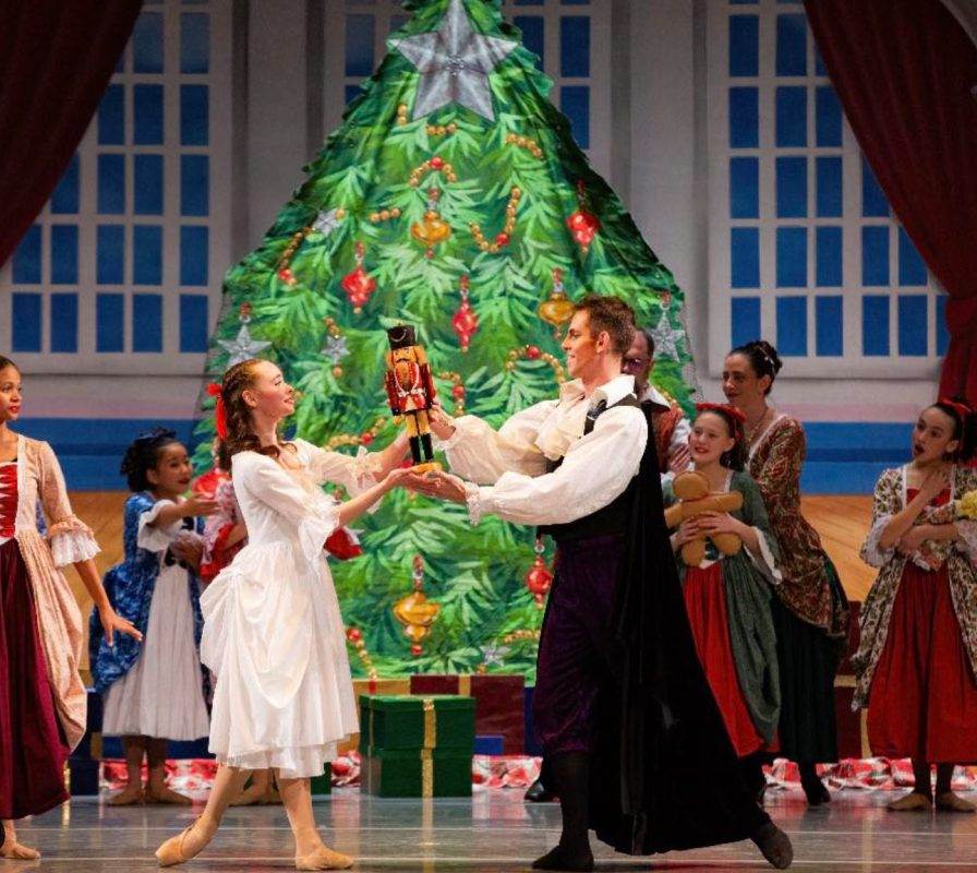 The nutcracker ballet, Drosselmeyer presents the nutcracker doll to Clara