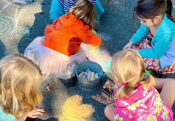 kids drawing with chalk outdoors, summer camp at Free Union Country Day School near Charlottesville