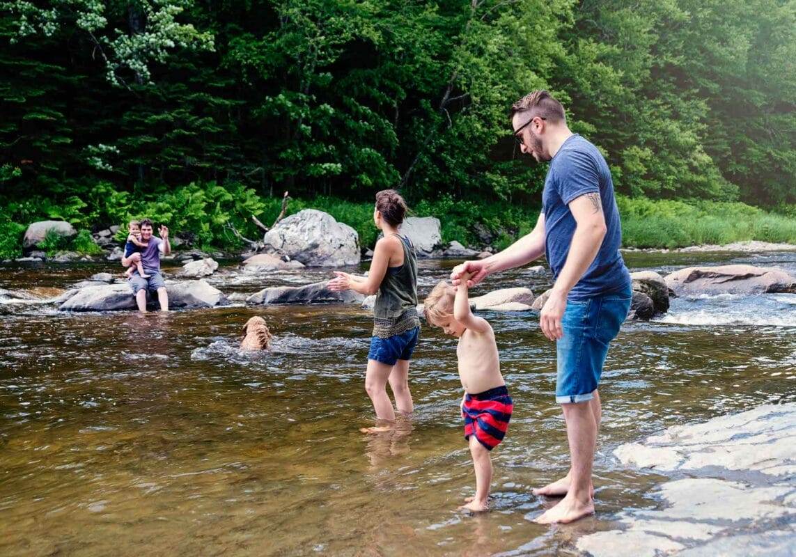Family at a swimming hole
