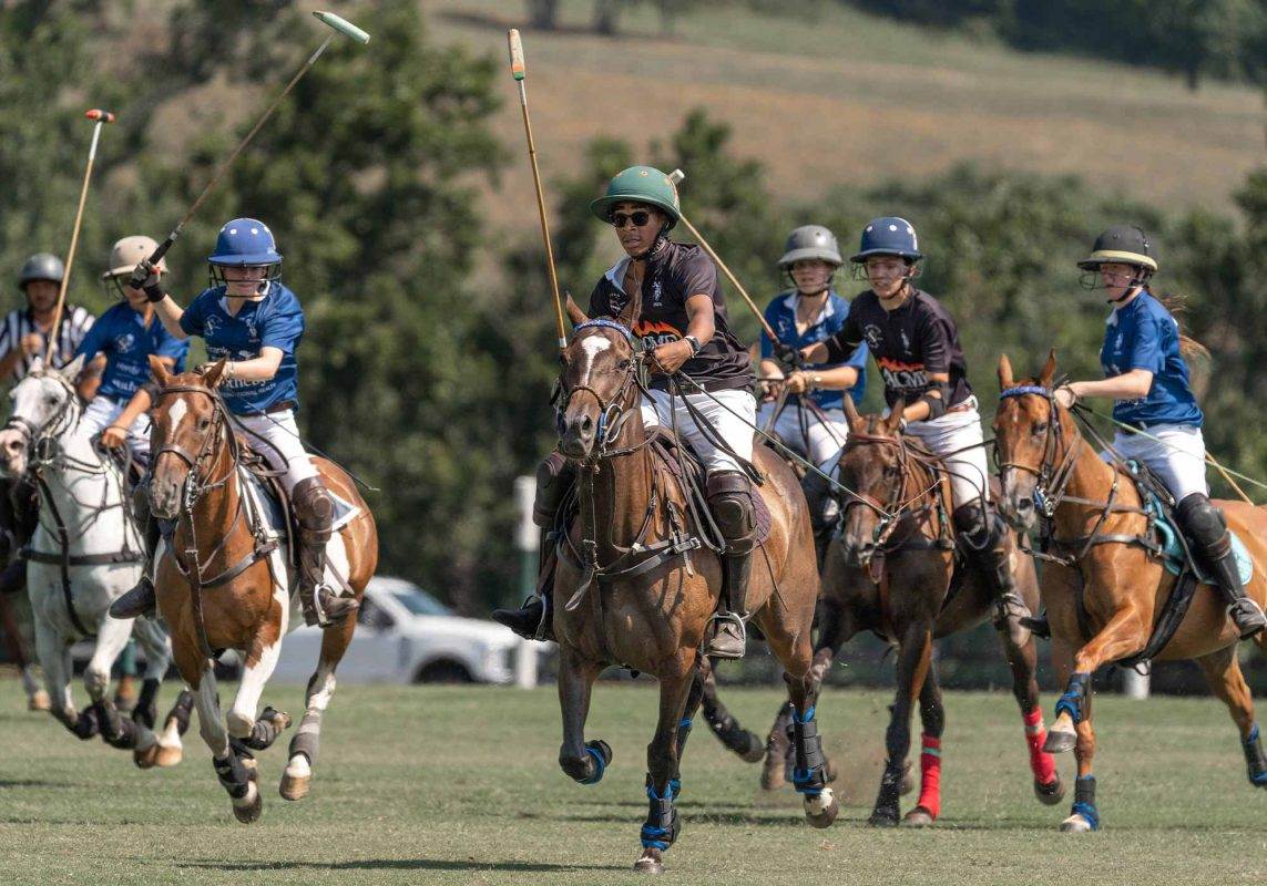 students on horses at roseland polo school, learning to play polo.