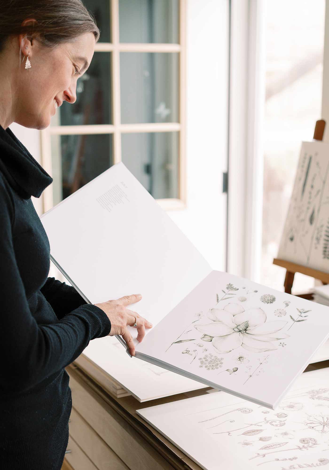 Lara Call Gastinger sharing a dogwood illustration in her journal