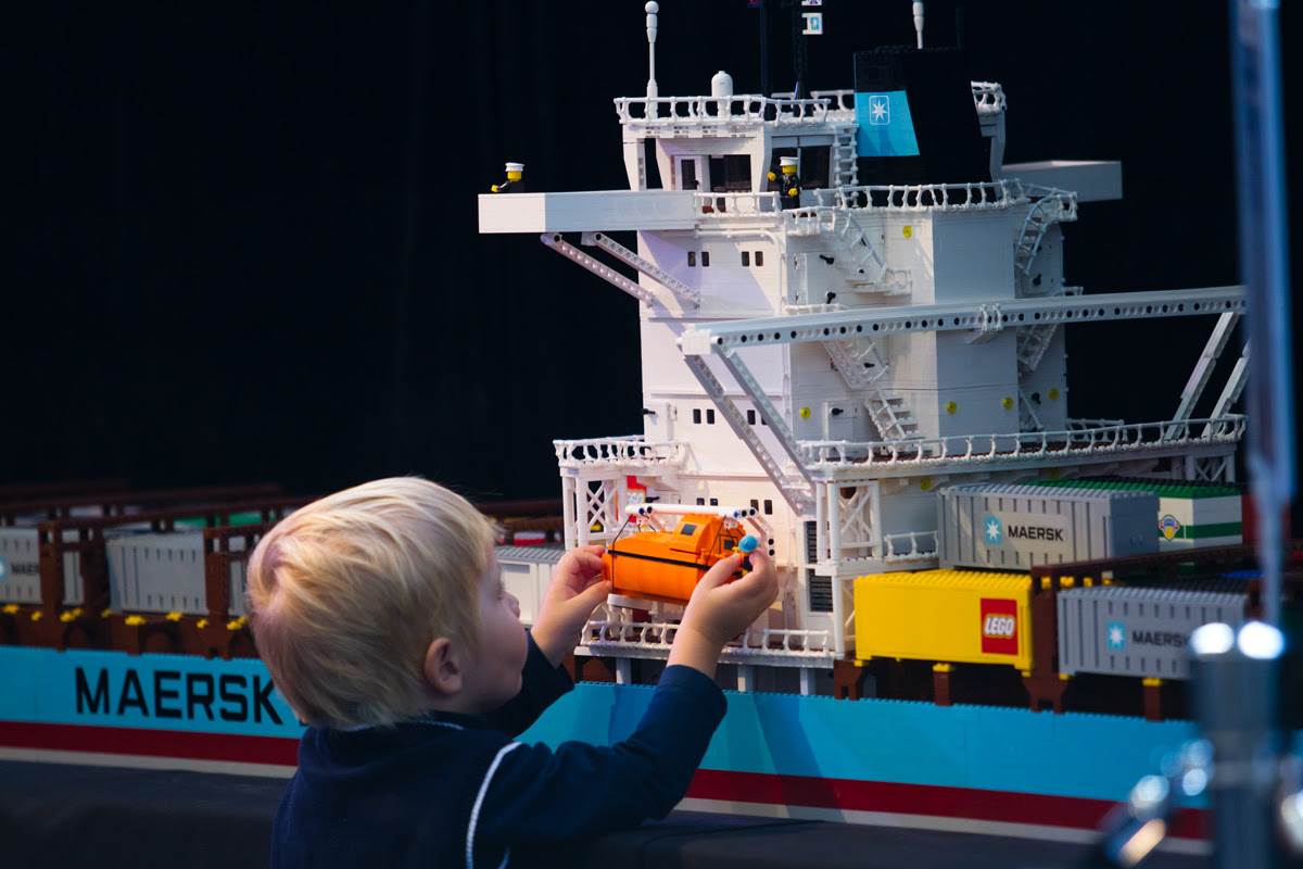 little boy at LEGO exhibit