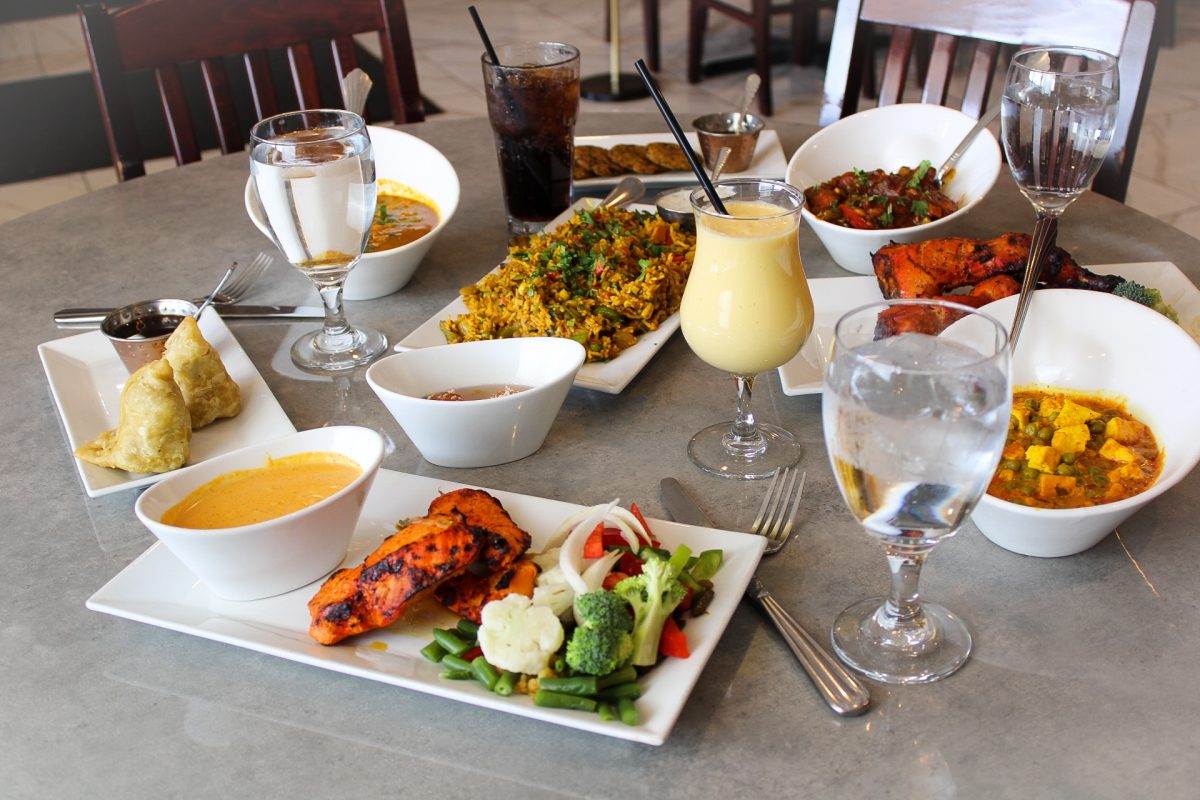 Bright assortment of indian dsihed on the table at Milan Indian