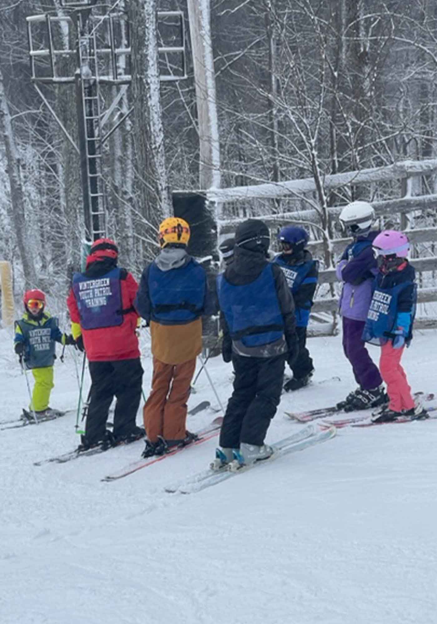 wintergreen ski patrol in snow on slopes