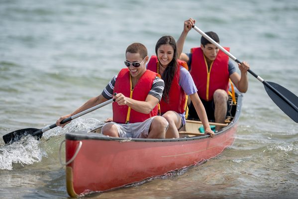 teens canoe at camp
