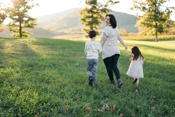 woman walking with children